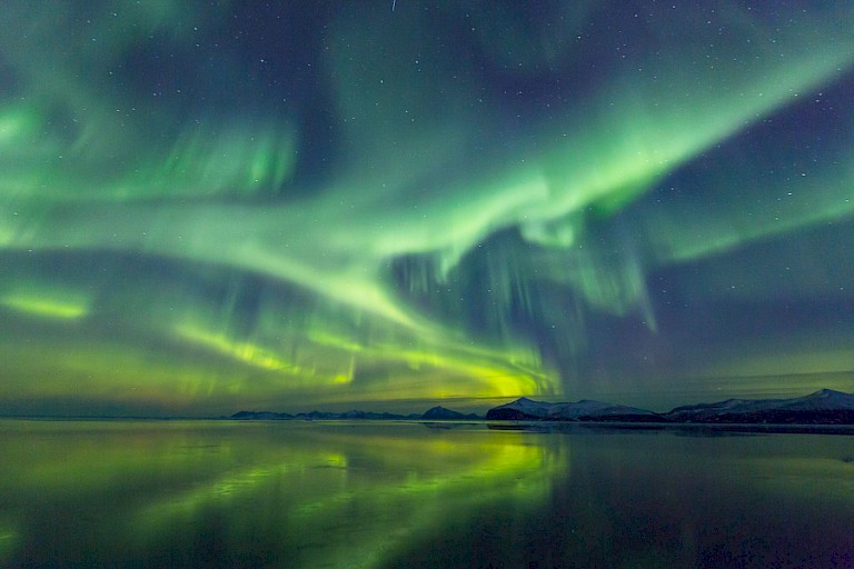 Noorderlicht (Aurora borealis) bij het verlaten van Oost-Groenland. Foto: Andrey Kamenev.